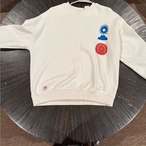 Zara Cream Sweater with Blue and Red Accents
